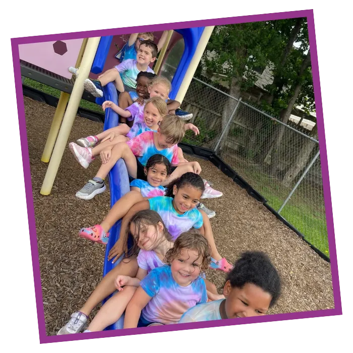 children on slide in playground