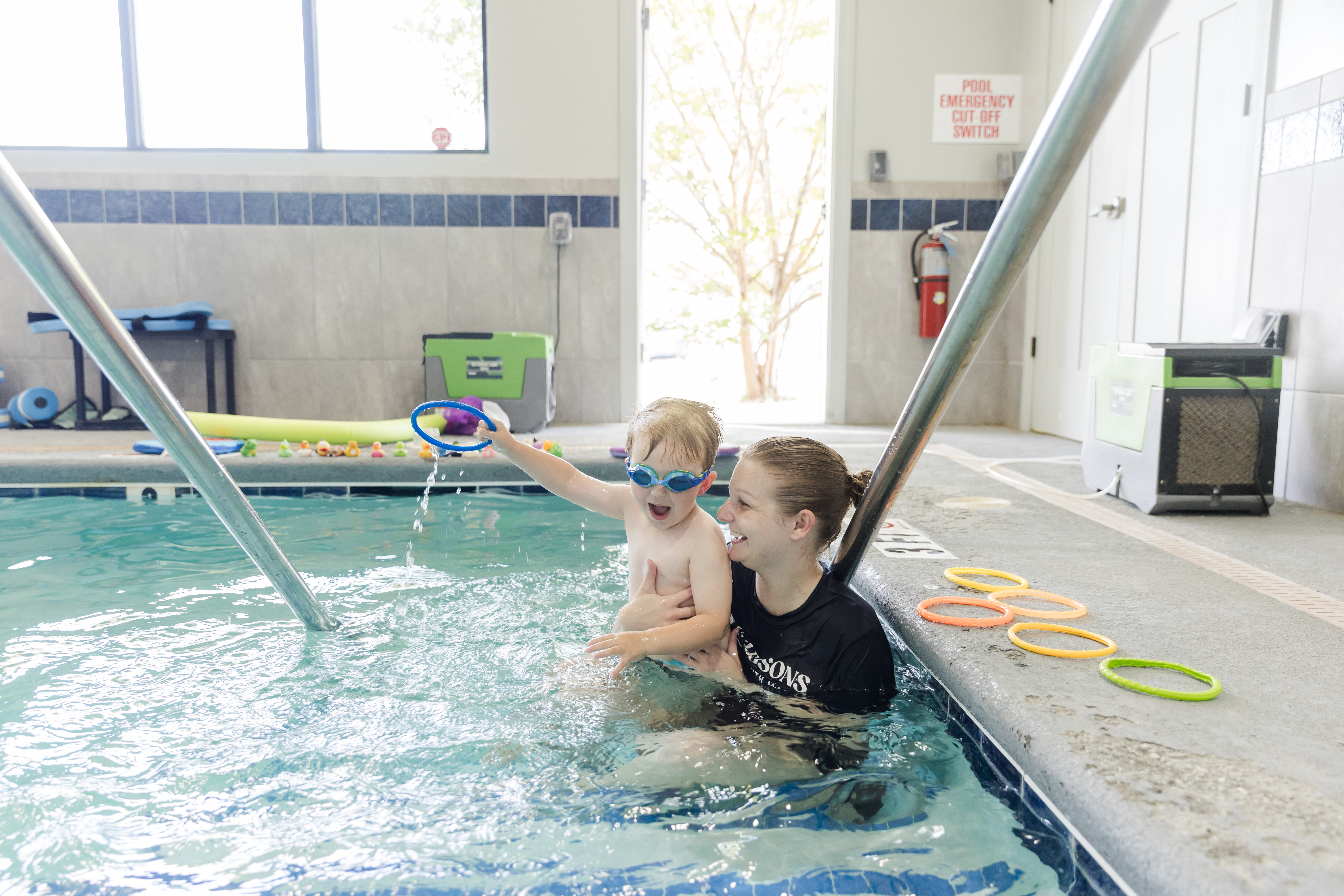 Dedicated private swim coach providing attentive 1-on-1 instruction in warm clear water