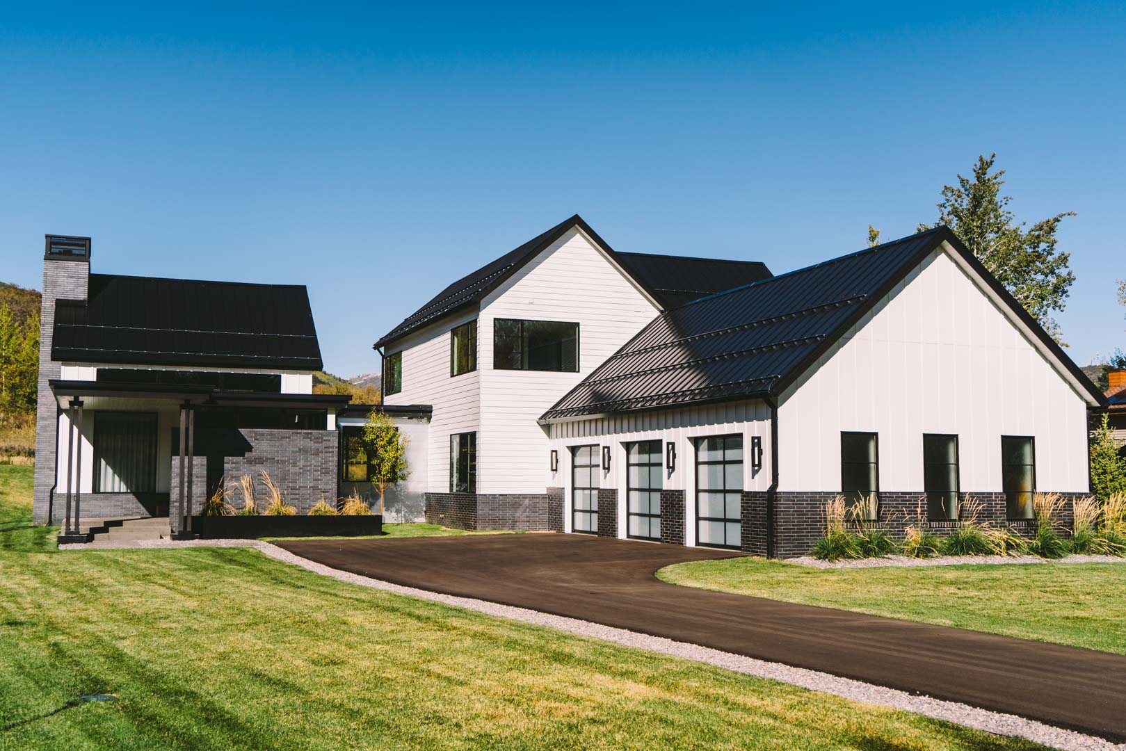modern home with newly installed asphalt shingle roofing