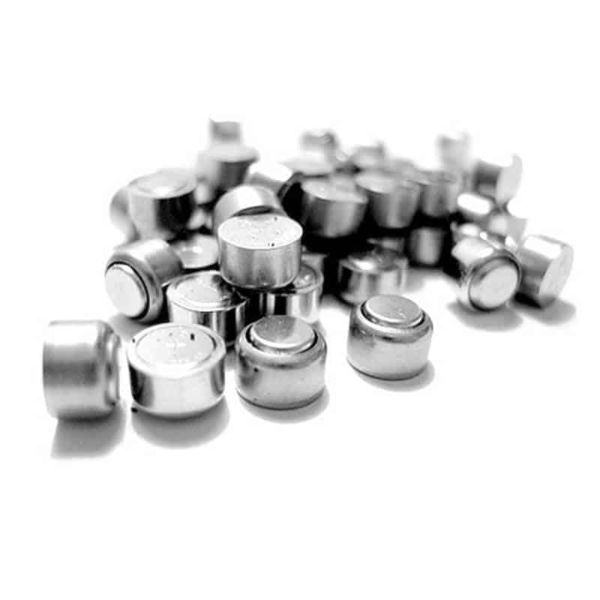 a pile of hearing aid batteries