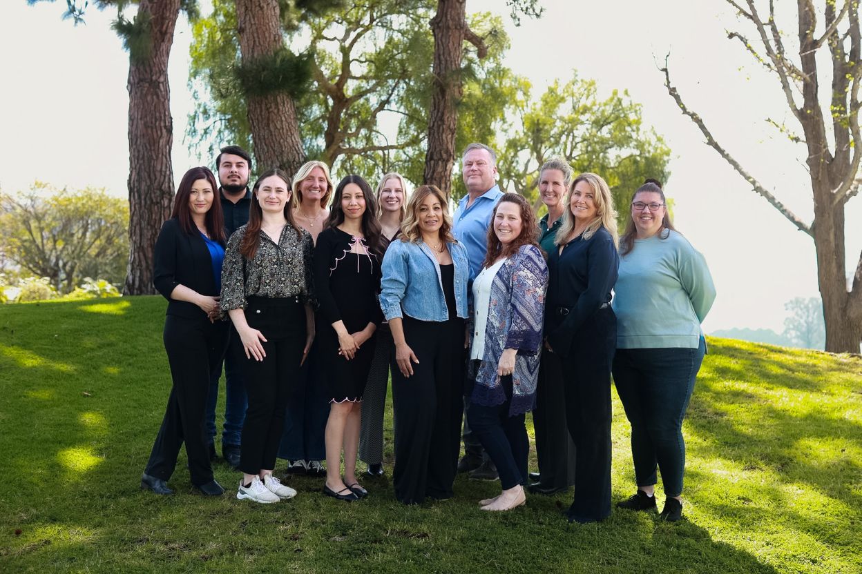 Parker Hearing Staff standing outside