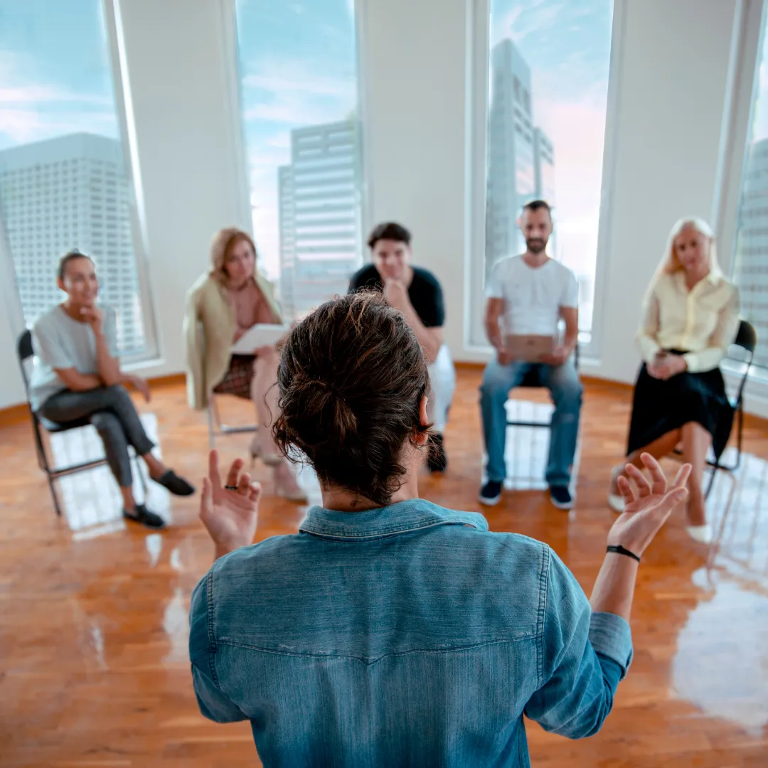 a close up of some white flowers on a tree