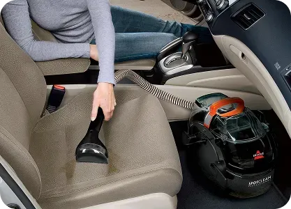 Freshly shampooed passenger seat of a professional detail | Tri-City Premier Detailing