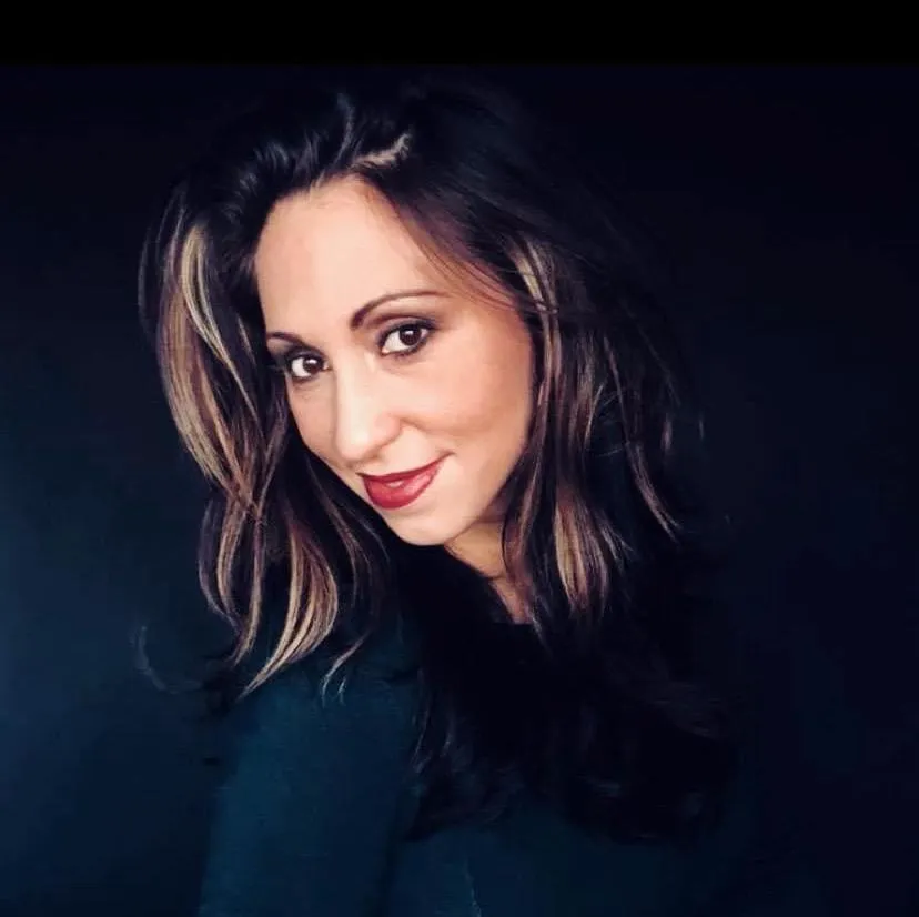 Elegant portrait of a woman in her 50s in soft studio light