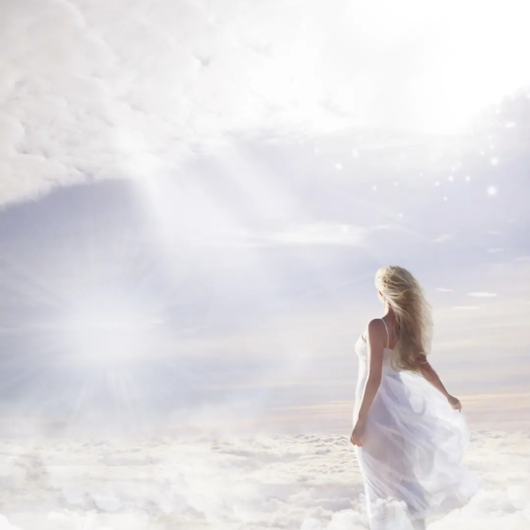 what is mediumship, Elaine Somerville, spiritual medium, mentor, healer, readings, silver grey with white clouds and rays of light, blonde haired woman looking peaceful