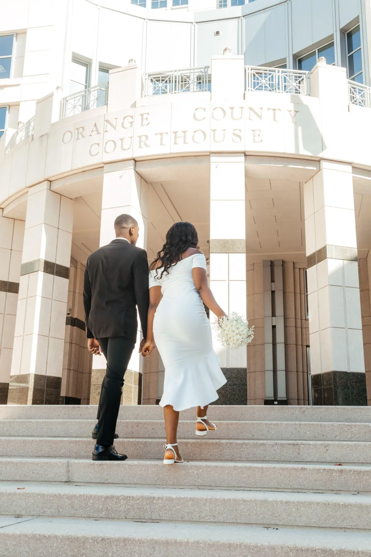 Elegant Wedding couple smiling at Lake Eola park