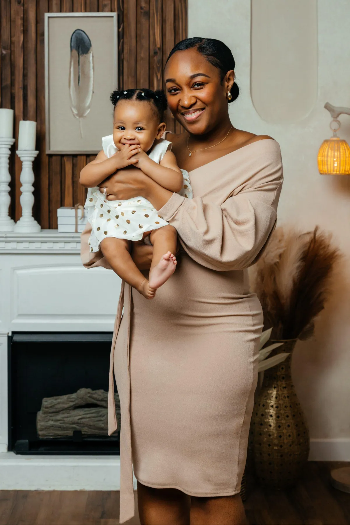 Mother and daughter captured in a joyful studio moment