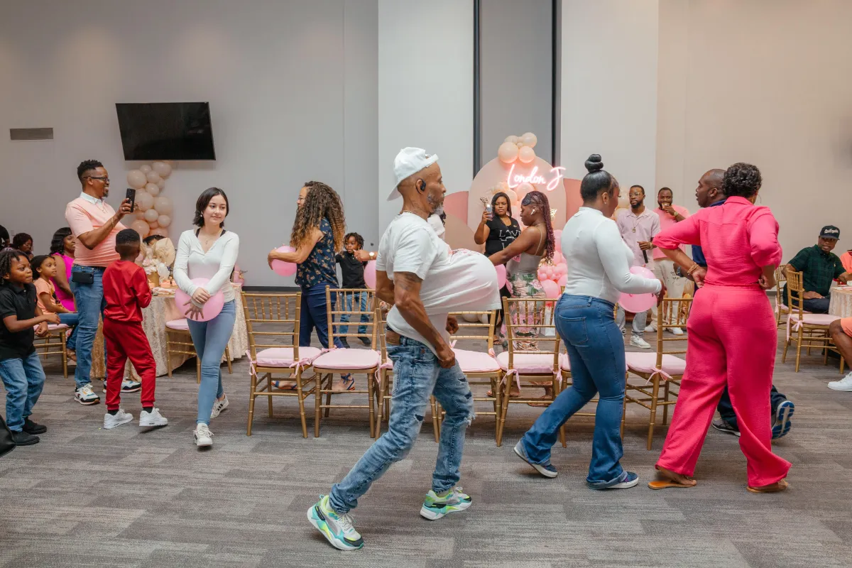 Candid of mom hugging daughter before ceremony in Orlando