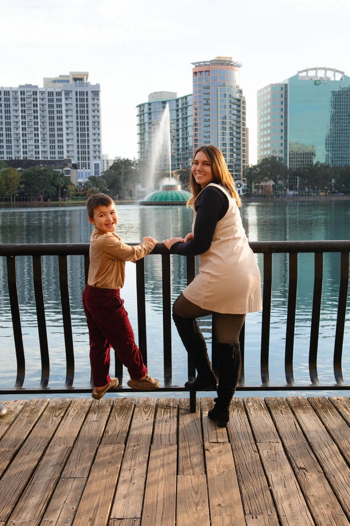 Mom and sun posing at Lake Eola Park Mom and sun posing at Lake Eola Park