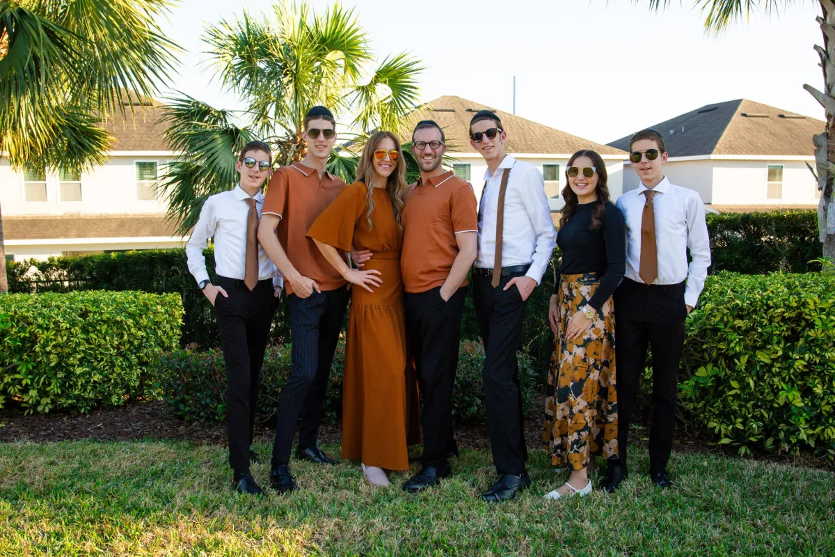 Jewish family taking family vacation photos