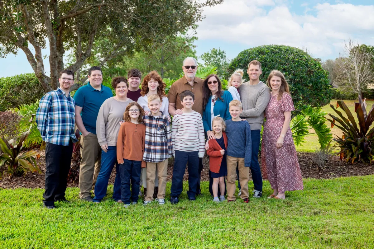 Family photos at Lake Eola Park during golden hour