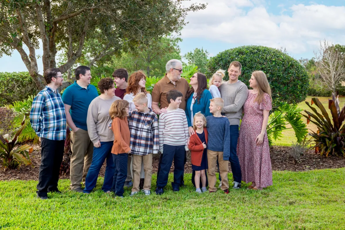 Family wearing fall colors during Orlando vacation photoshoot