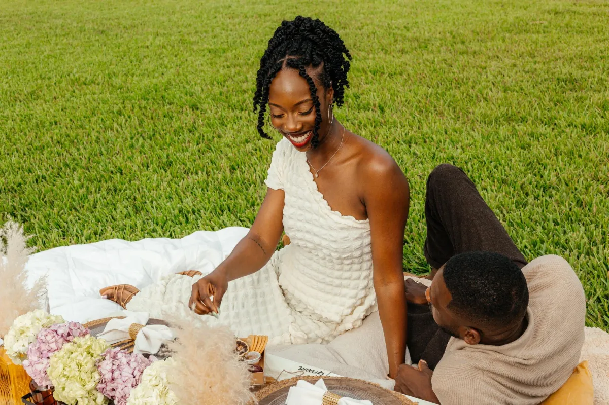 Couple having a luxury picnic