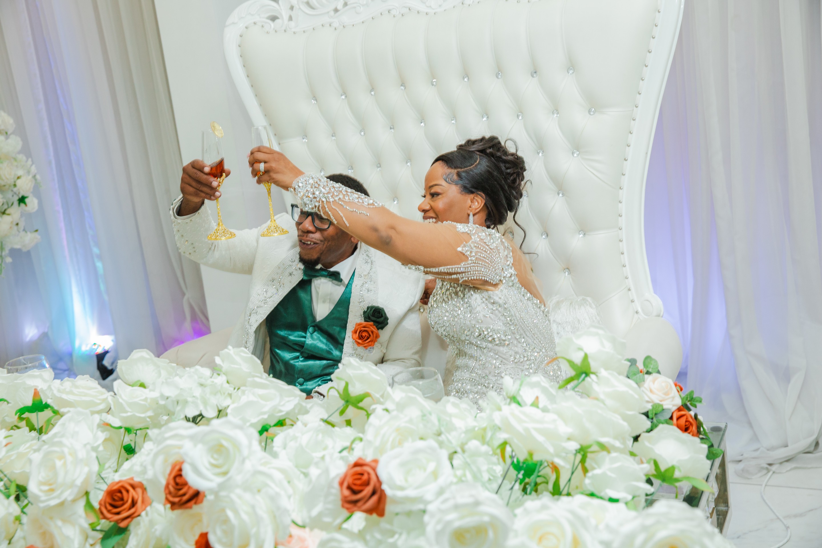 Groom twirls bride by Lake Eola, Orlando