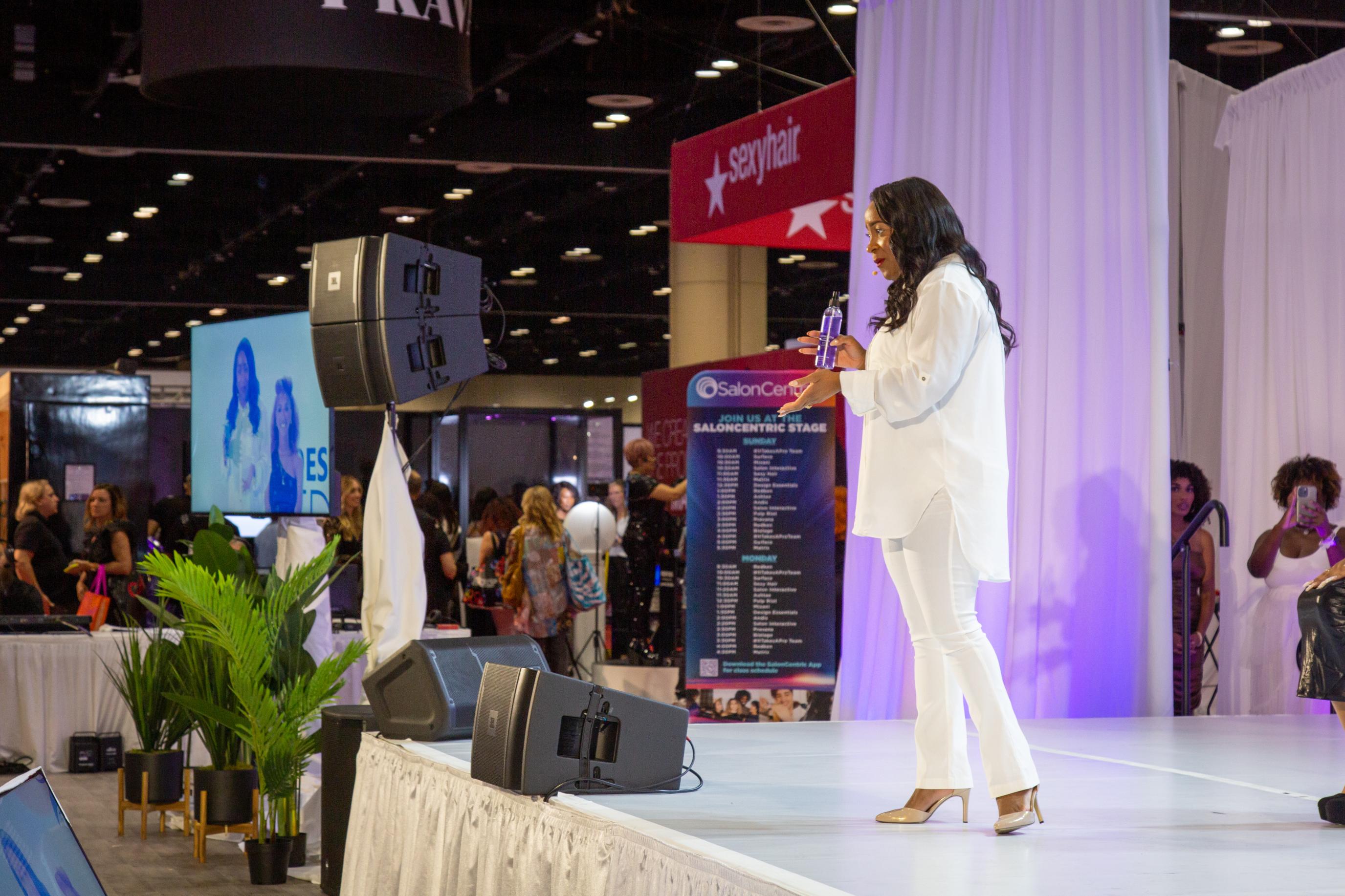 Candid of mom hugging daughter before ceremony in Orlando