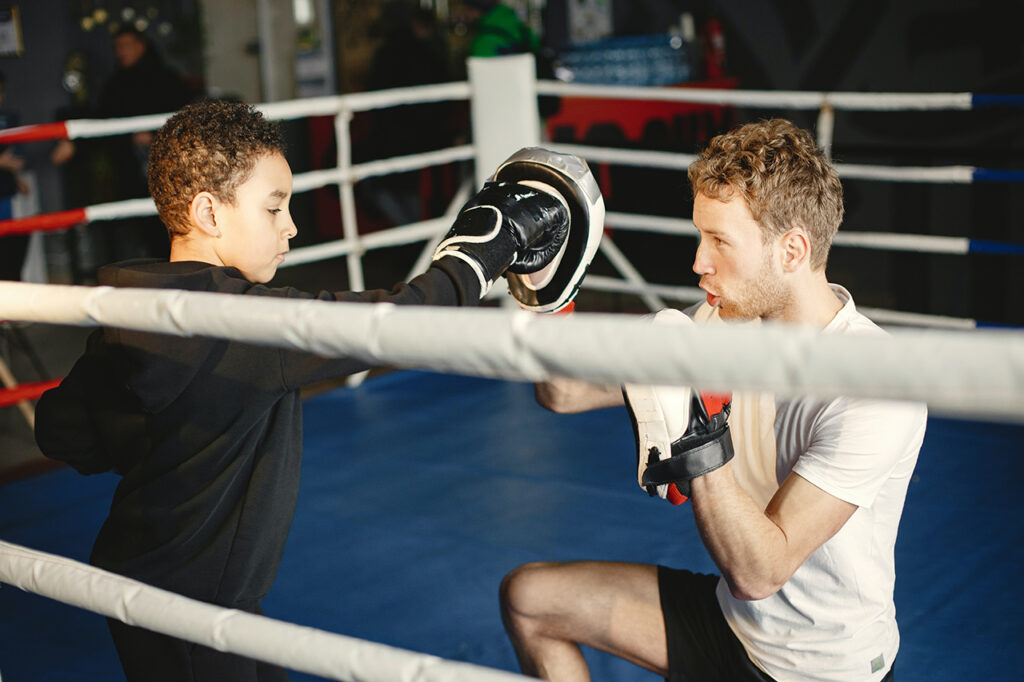 How Teaching Your Kids Combat Sport Sets Them Up For Success Later In Life