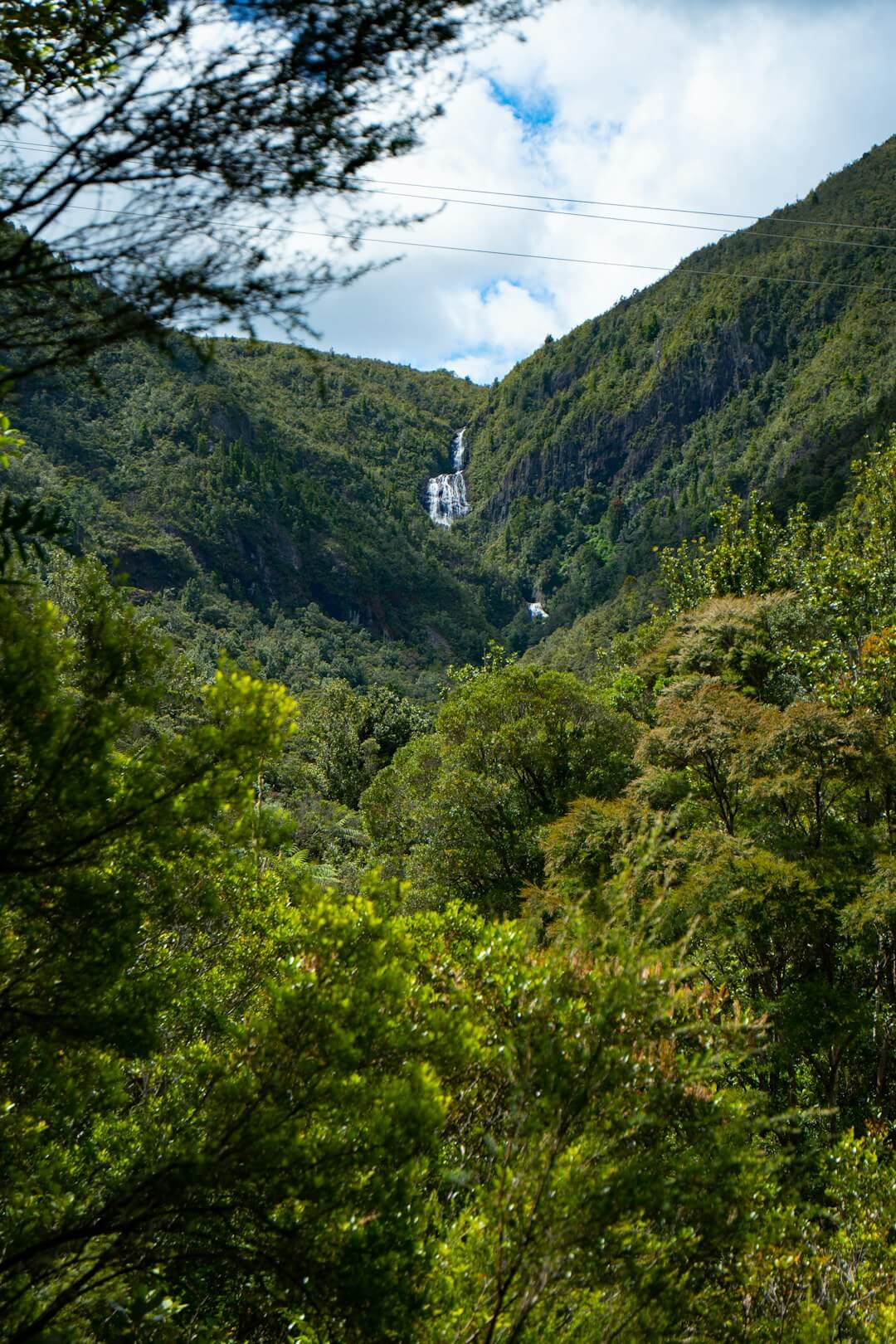 Marokopa Falls in the Waitomo region featured on a Classic Car Tours scenic tour in Waikato, New Zealand