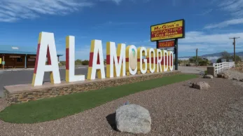 Spacious deck with pergola and built-in seating in Desert Villas, Alamogordo