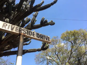 Composite river-facing deck with railing and seating near Riverside