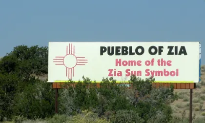 Compact composite deck with pergola in Zia Neighborhood