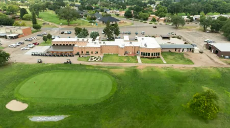 Two-level deck with grill station in Colonial Park backyard