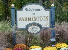 Large cedar deck with pergola and BBQ station in North Farmington