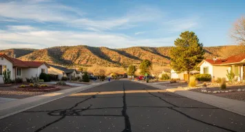 Tiered hillside deck with railing in Farmington Foothills neighborhood