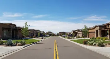 Composite deck with pergola and stairs in Zia Crossing backyard
