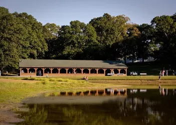 Multi-tier cedar deck with seating in Taylor Ranch neighborhood