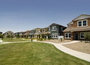 Large deck with pergola and seating in Northern Meadows backyard