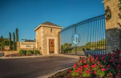 Modern composite deck with privacy screen in Enchanted Hills