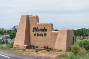 Multi-level cedar deck with outdoor kitchen in Eldorado at Santa Fe