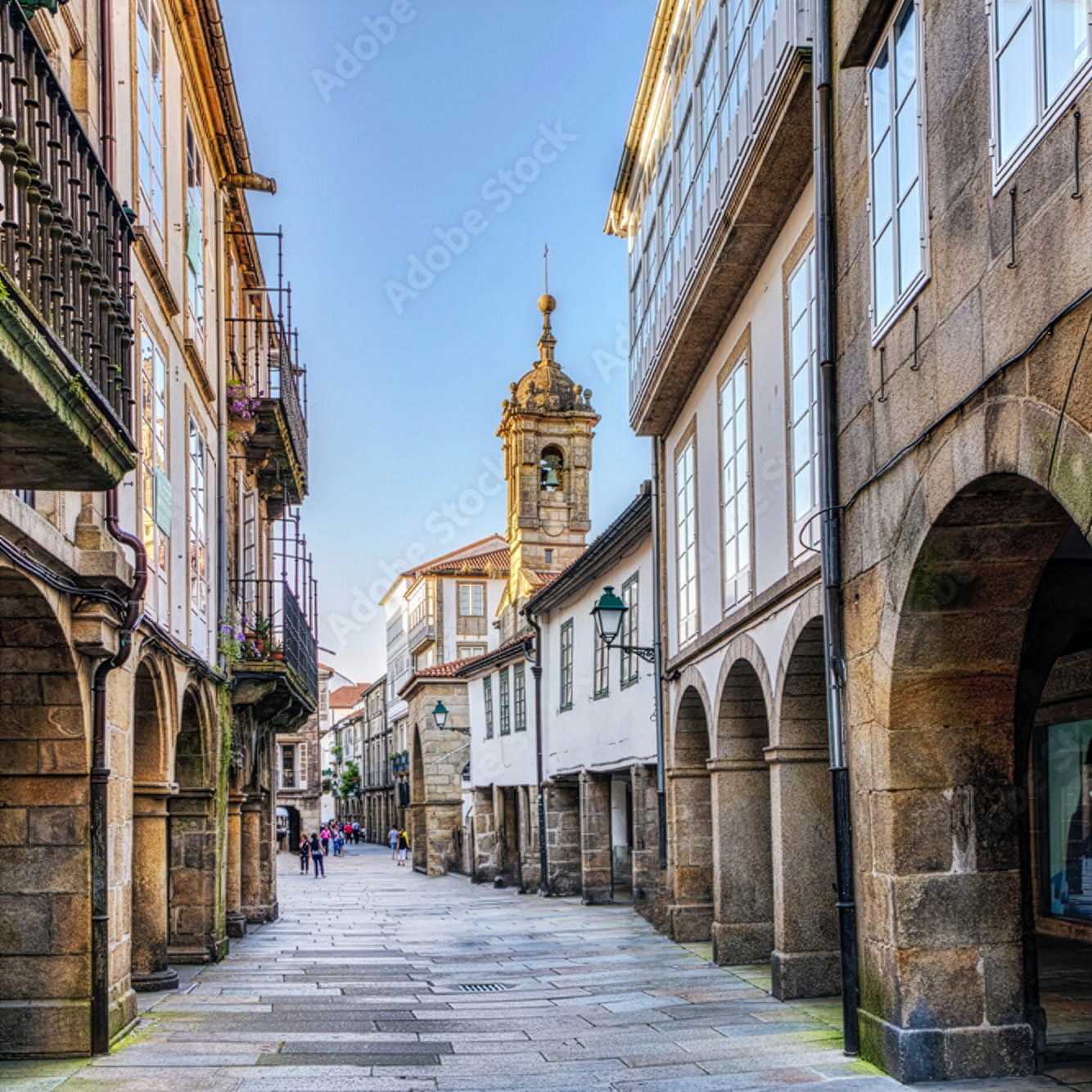 Arcaded stone street in the old town of Santiago de Compostela