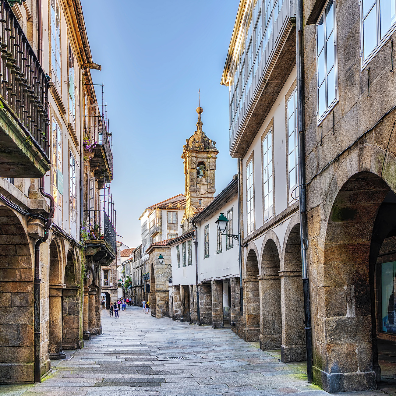 Arcaded stone street in the old town of Santiago de Compostela