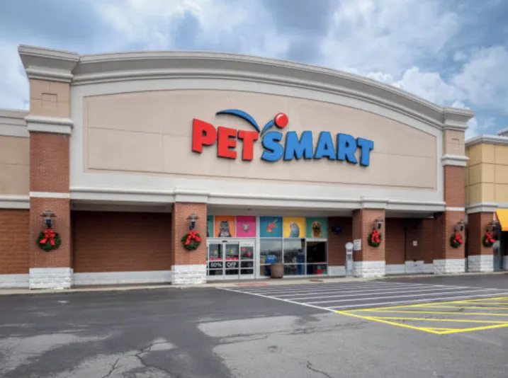 Exterior storefront of PetSmart retail location in commercial plaza