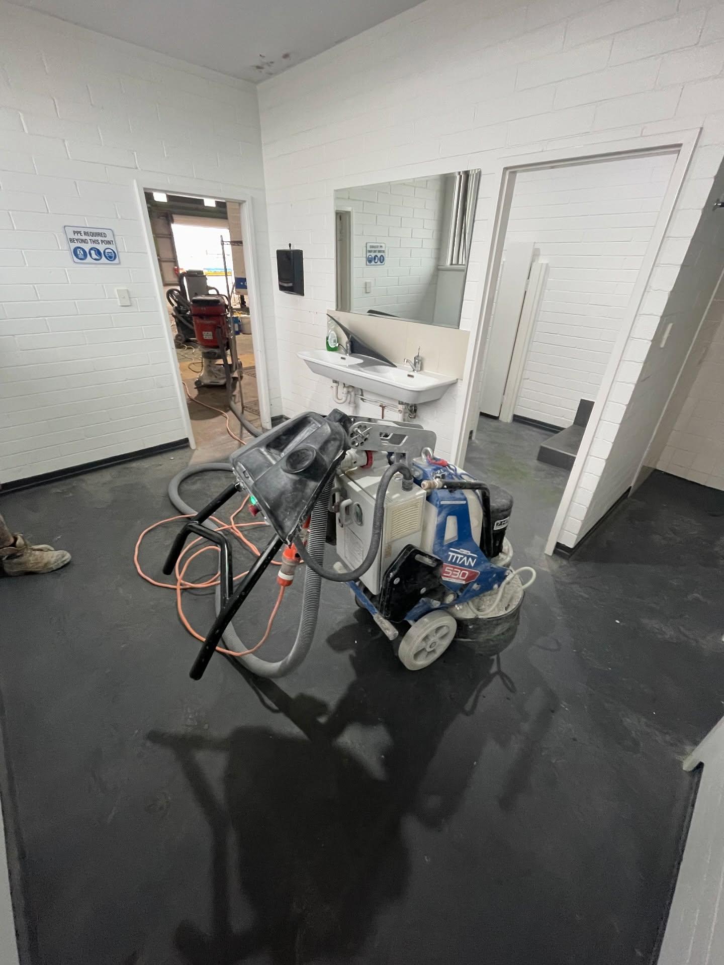 Commercial floor preparation process using floor grinding and cleaning equipment