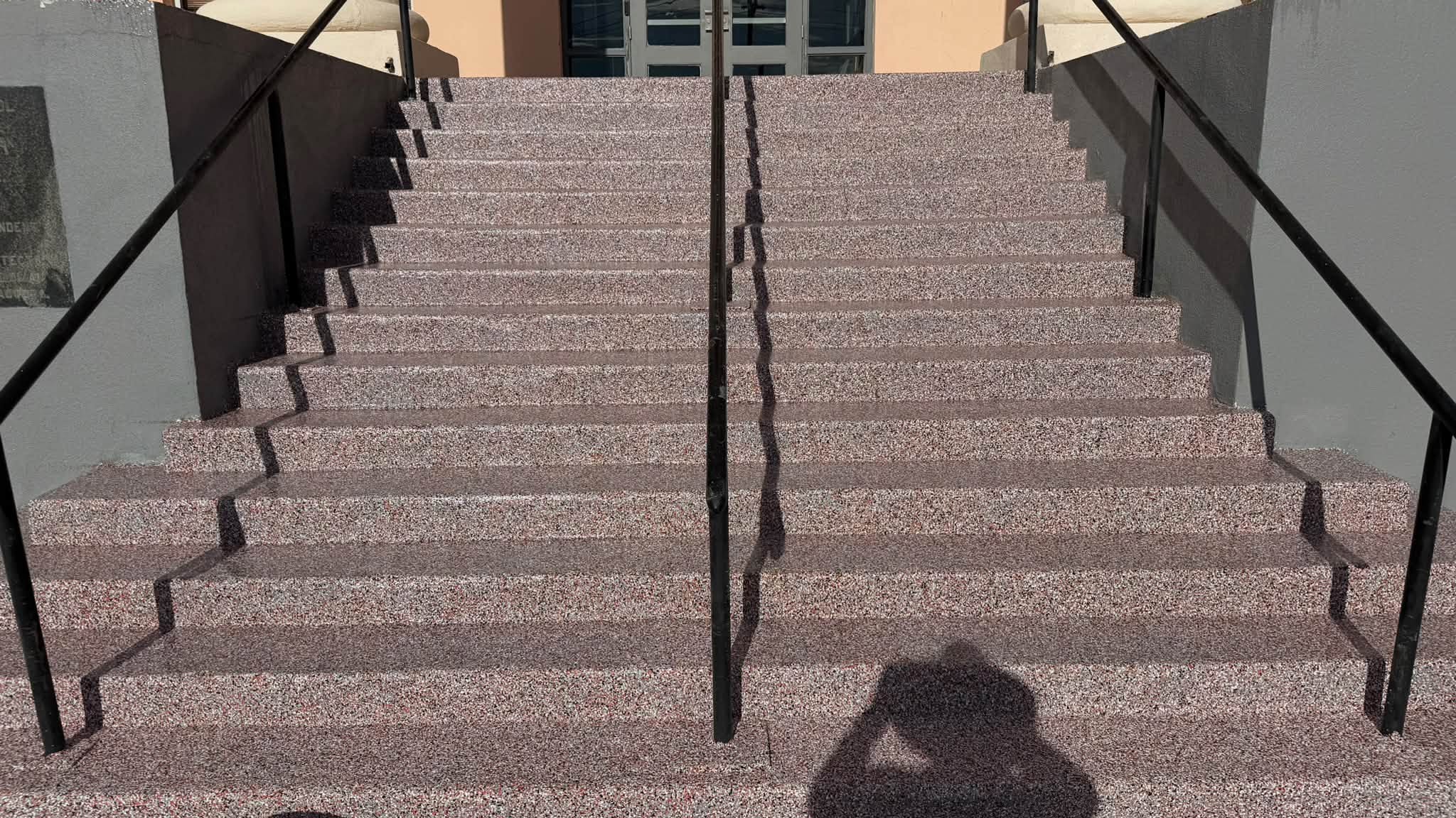 Exterior wide concrete staircase with durable slip-resistant outdoor coating