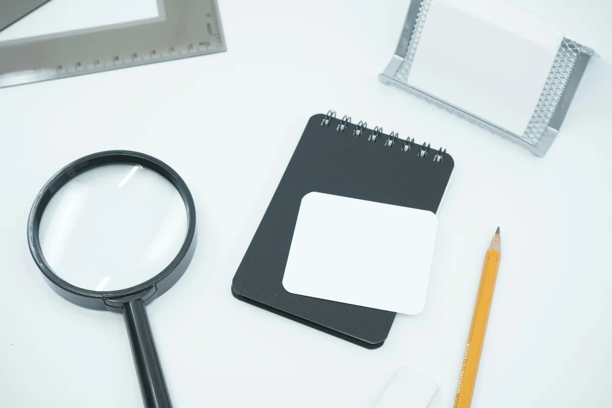 a white board with post it notes written on it