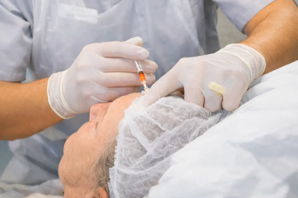 person holding black and gray car steering wheel