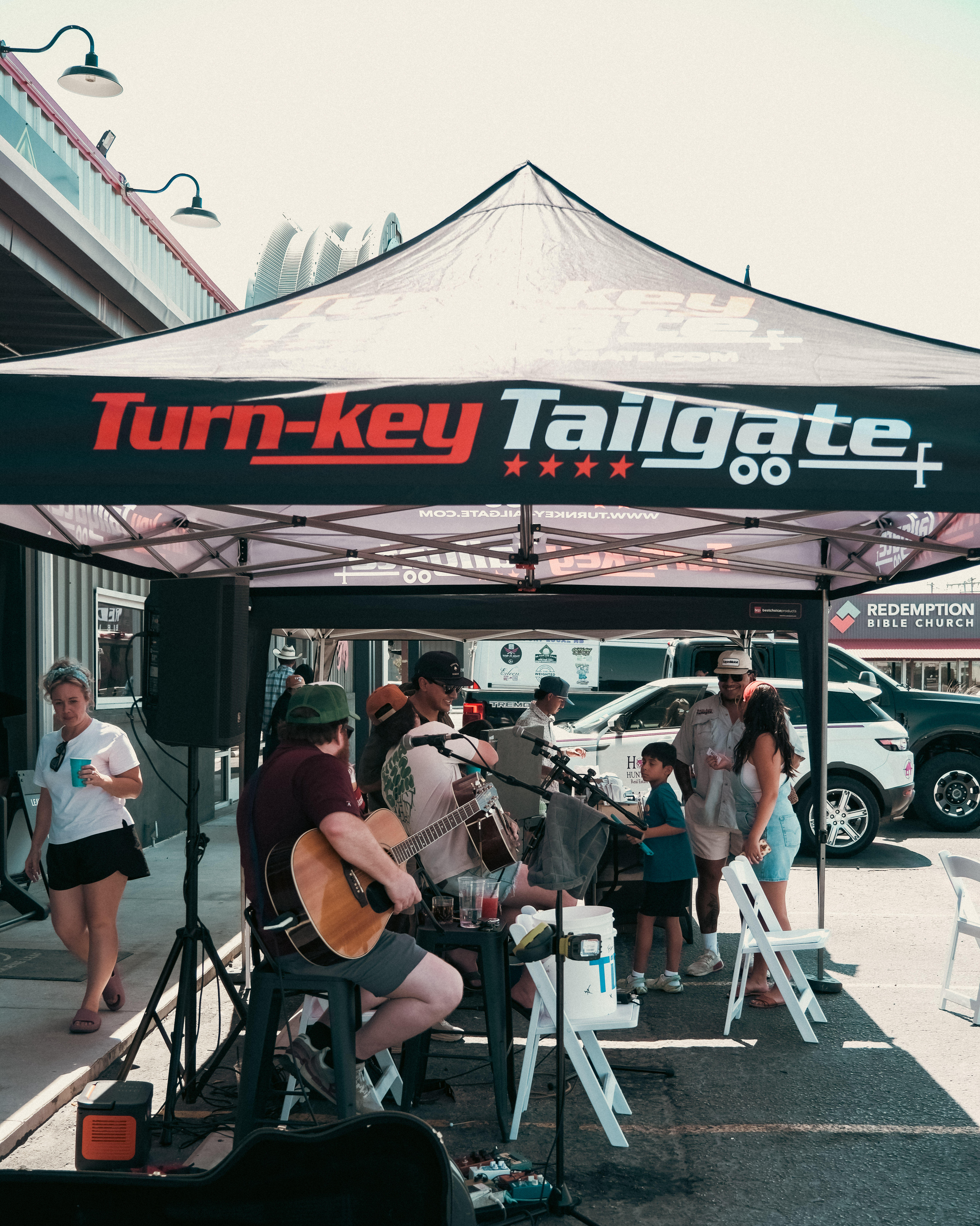 tailgate setup with live concert