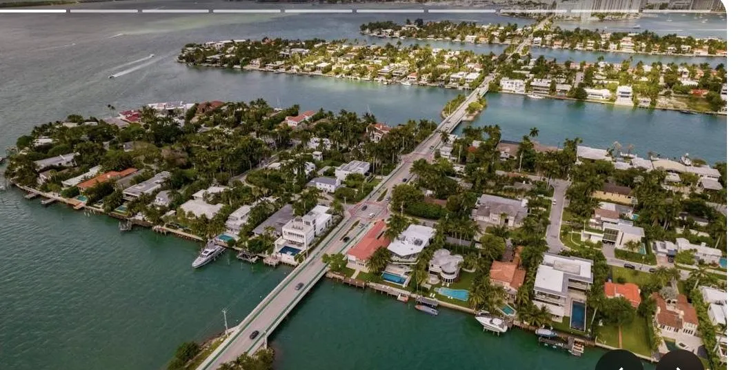 white and black ship on sea under blue sky during daytime