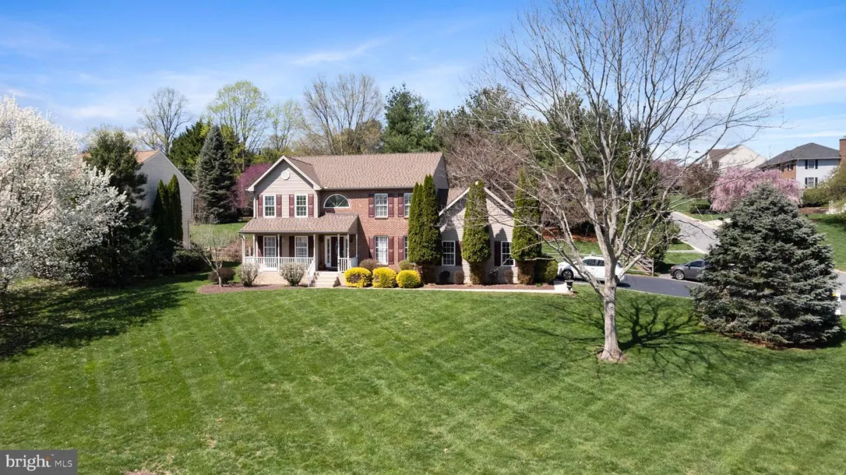 a kitchen with a center island with stools