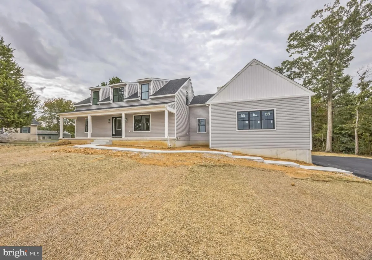 a modern house with a pool in the middle of the yard