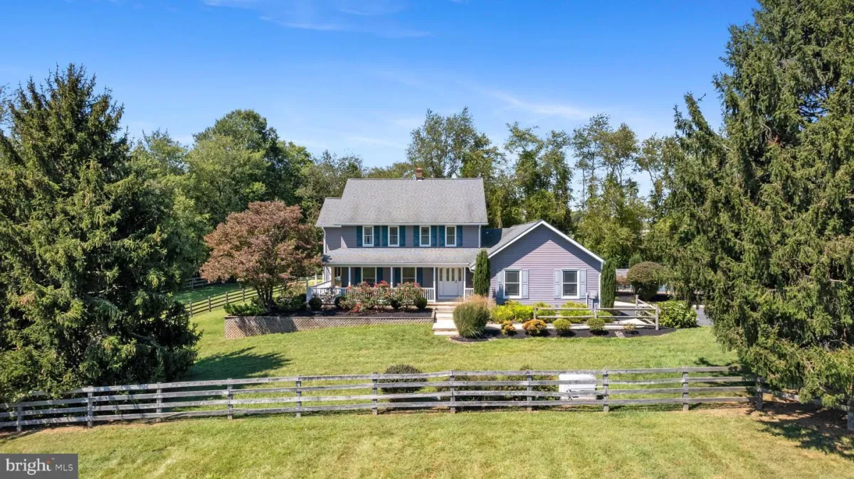 a modern house with a pool in the middle of the yard