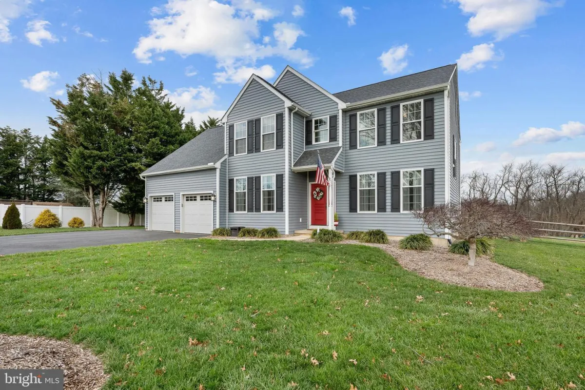 a modern house with a pool in the middle of the yard