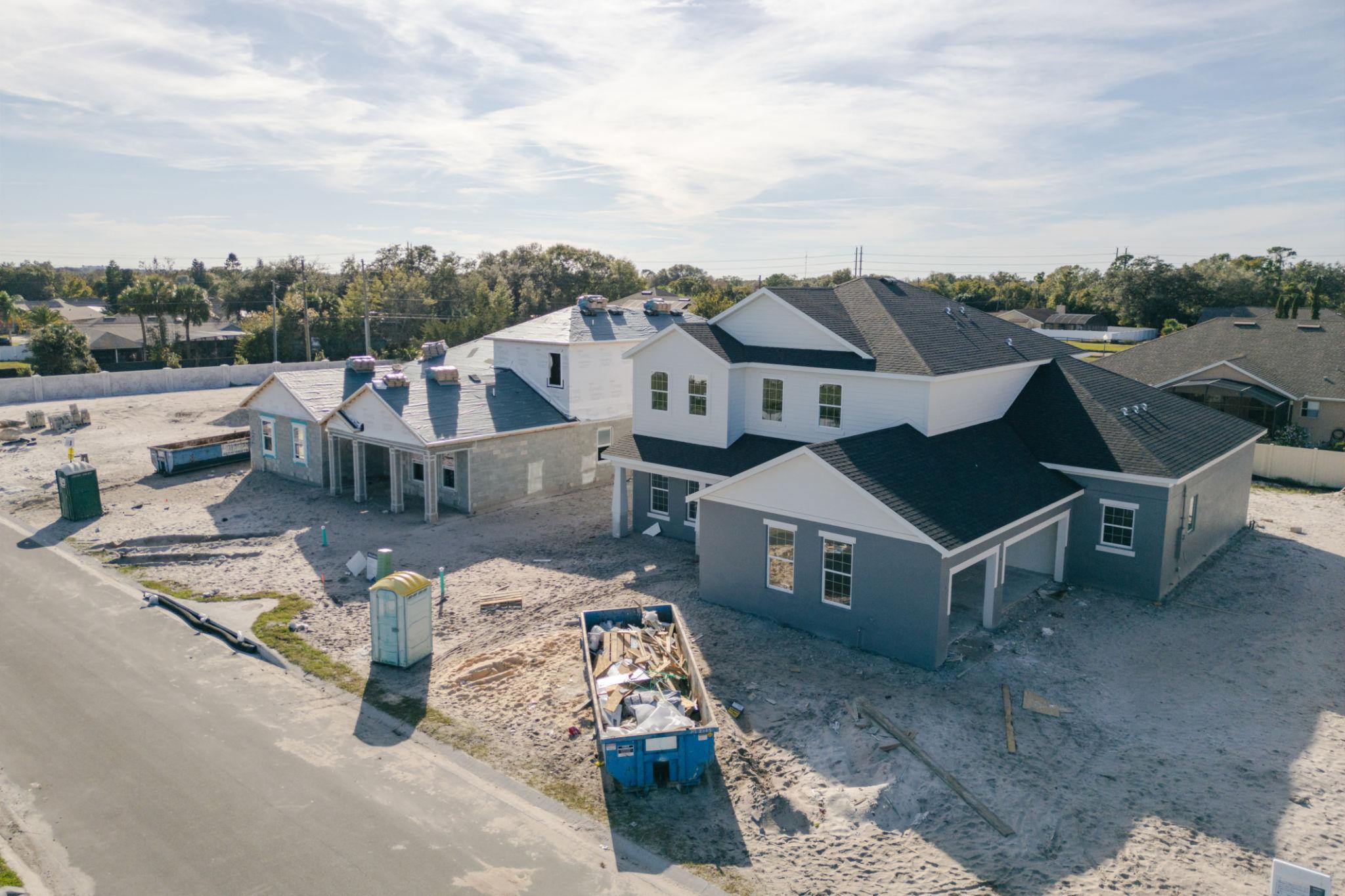 “Modern Florida new construction community featuring resort-style amenities and walking trails.”