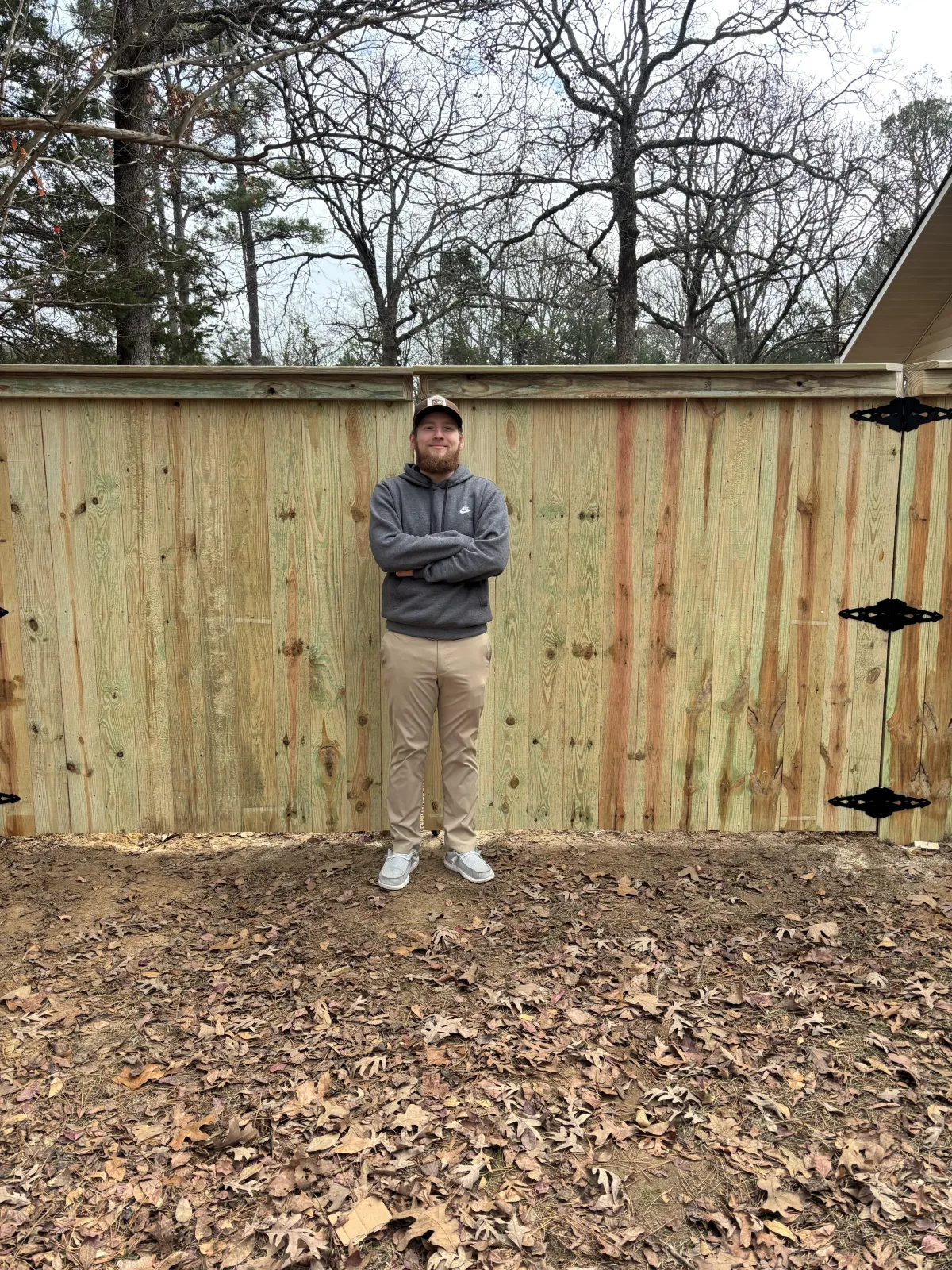 newly built privacy fence with upgrades in batesville backyard with trees