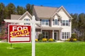 a very tall building with a sky background