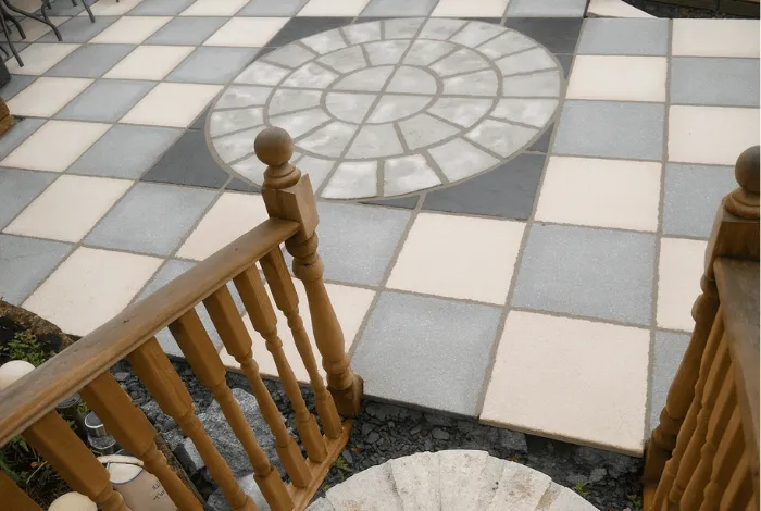 A rear garden patio with circle centre piece feature