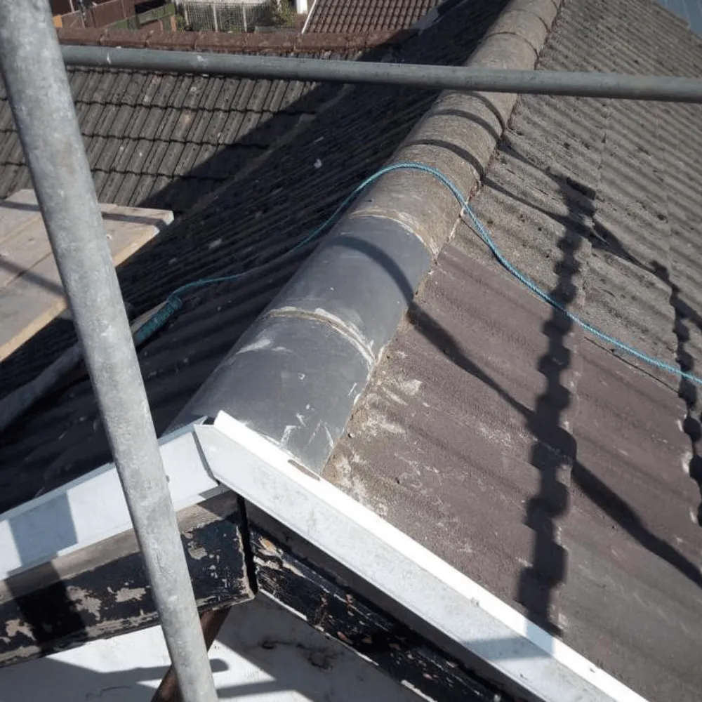 Roof ridge tiles that have been repaired
